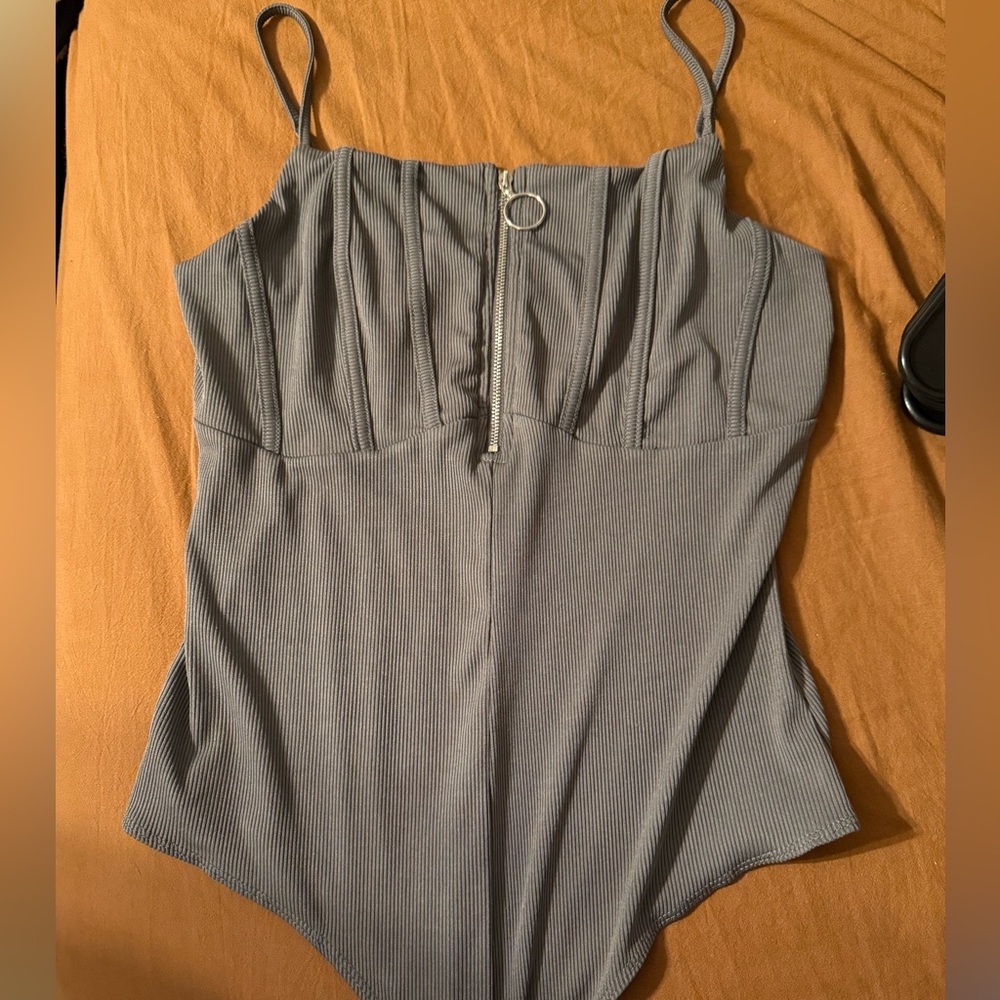 Grey body suit